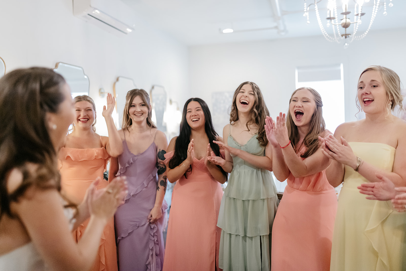 Bride Revealing Wedding Dress to Bridesmaids