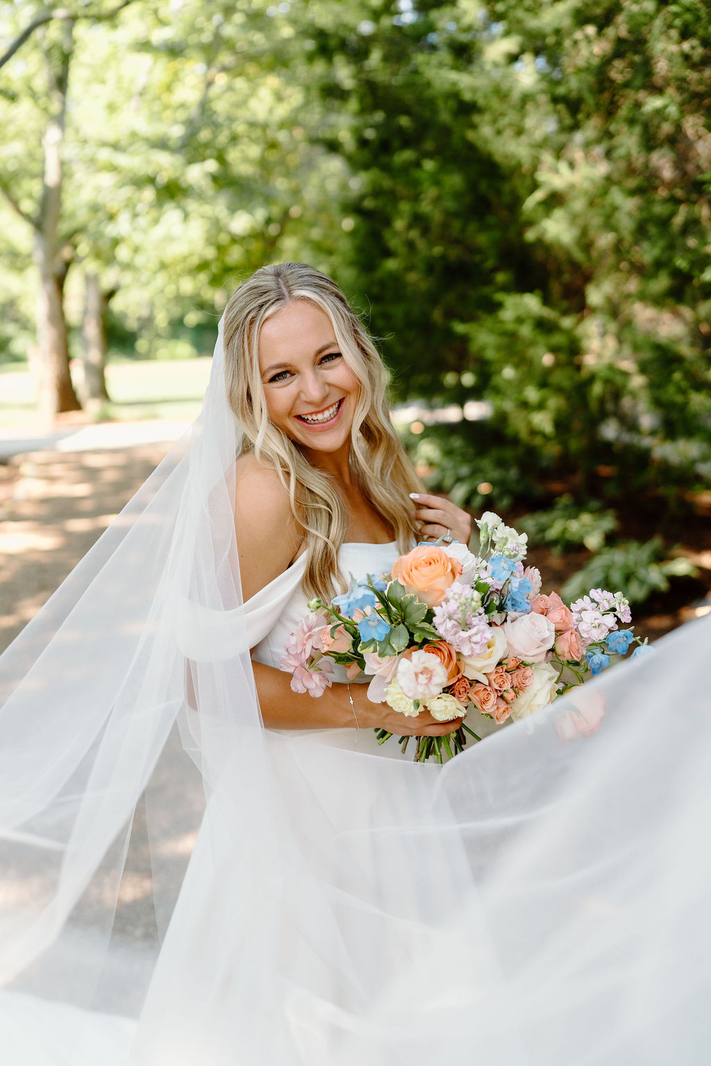 Southall Meadows Photos of Bride with Colorful Wedding Bouquet 